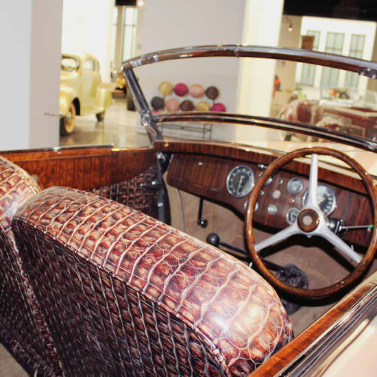 Cartel oficial del evento Museo del Automóvil y la Moda de Málaga